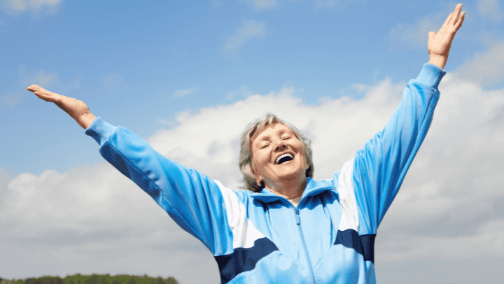 An Old Lady Raising Up Her Hands