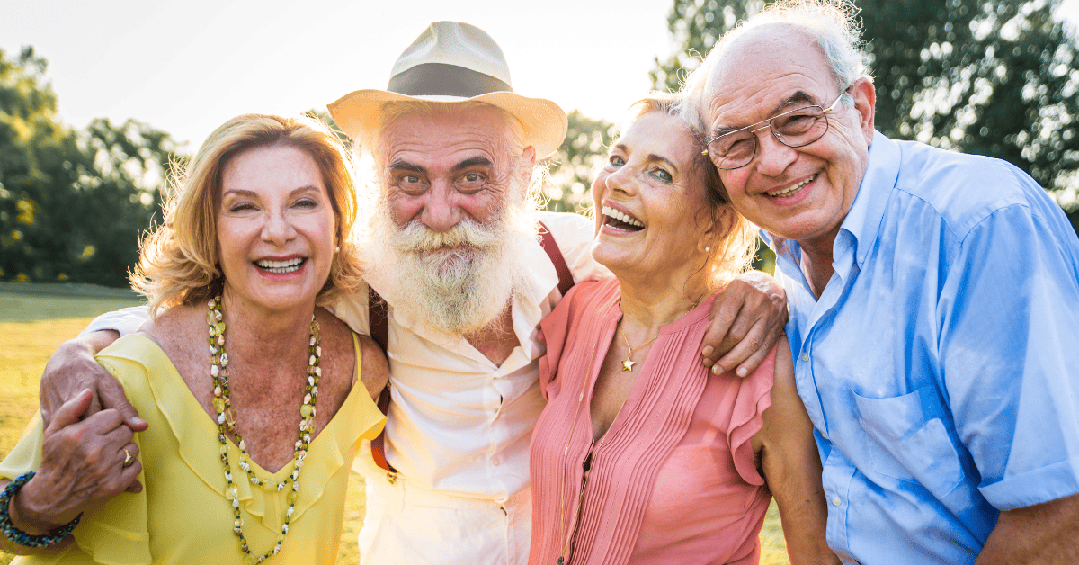 Seniors Hugging Outside