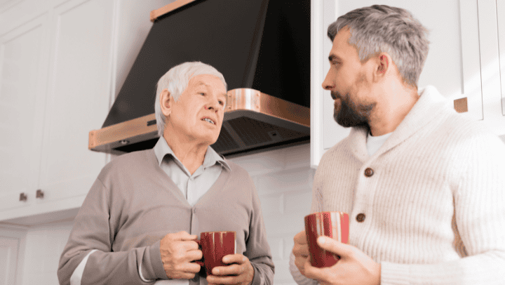 From Resistance To Relief: Your Parent'S Journey To Senior Living In Golden, Co 3 A Senior Father Having A Conversation With His Son